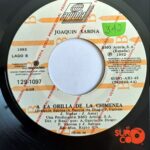 Disco de Vinilo Joaquín Sabina - Y Nos Dieron Las Diez / A La Orilla De La Chimenea (Promocional) Vinyl Record