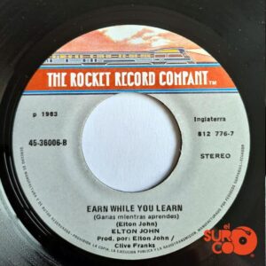 Disco de Vinilo Elton John - I’m Still Standing / Earn While You Learn Vinyl Record